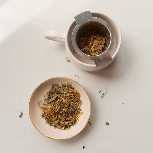 On Sundays Tea strainer in cup with tea